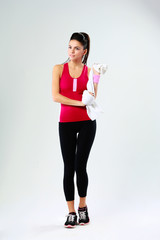 Naklejka premium woman with towel on gray background