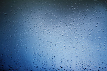 Water droplets on glass pane