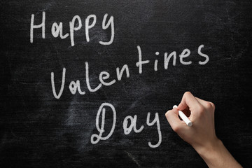 Fototapeta premium adult male hand write happy valentines day