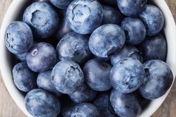 fresh blueberries in white bowl