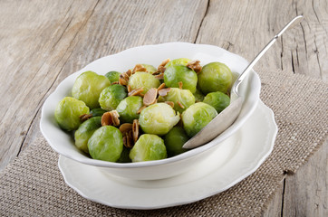 brussel sprouts with roasted almonds in a bowl