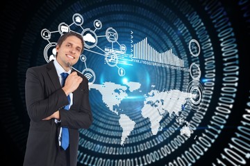 Composite image of thinking businessman holding pen