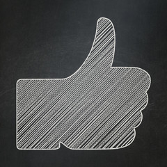 Social media concept: Thumb Up on chalkboard background