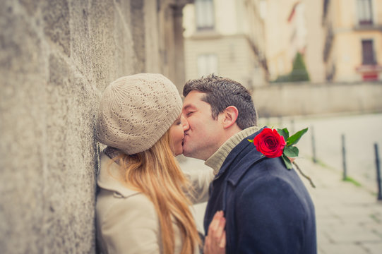 Couple With A Rose Kissing On Valentines Day