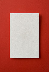 paper card on a red background