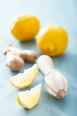 lemon and ginger over blue background