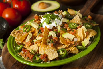 Homemade Unhealthy Nachos with Cheese and Vegetables