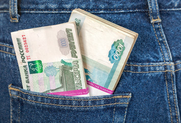 Pile of russian rouble bills in the back jeans pocket