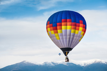 Fototapeta premium Multicolored Balloon in the blue sky