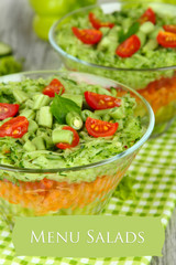 Tasty salad with fresh vegetables on wooden table