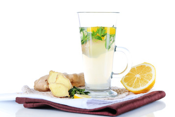 Cup of tea with ginger on napkin isolated on white