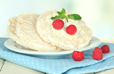 Tasty crispbread with berries, on white table