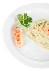 Pasta with shrimps on white plate, isolated on white