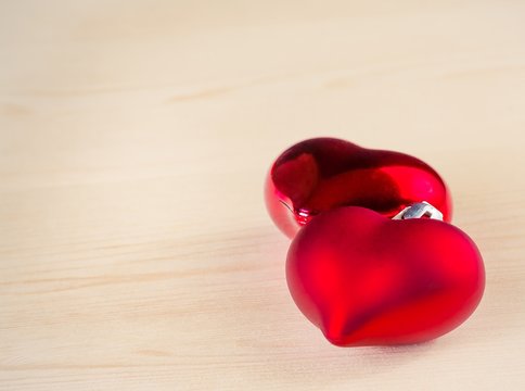two red hearts on wood background, concept of valentine day