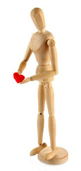 Wooden mannequin holding red heart isolated on white