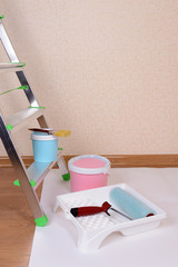 Metal ladder and paint in room