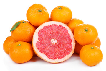 Ripe sweet tangerines and grapefruit, isolated on white