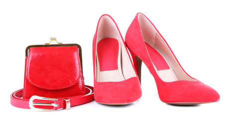 Beautiful red female shoes, purse and belt, isolated on white
