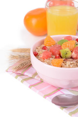 Delicious oatmeal with fruit in bowl on table close-up