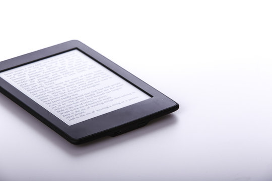 black ebook reader or tablet on white background