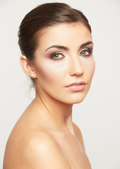 Close up portrait of beautiful young woman face.