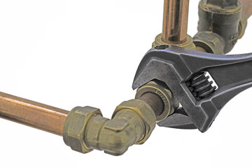 wrench on pipework