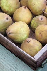 pears in wooden tray