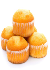 cup cakes stack up on a white background