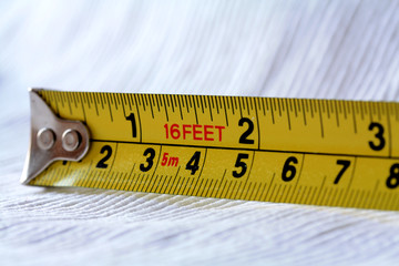 Yellow Tape Measure with Inches and Centimeters