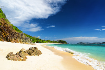 White sand beach. Malcapuya island, Philippines