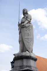 Riga, Latvia. Sculpture Harold Knight (1896) on the Town Hall Sq