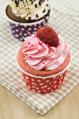 Tasty cupcake with butter cream