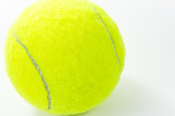 Closeup of tennis ball isolated on white background.