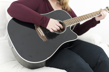 Young woman with guitar