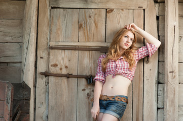 Fototapeta premium red haired cowgirl