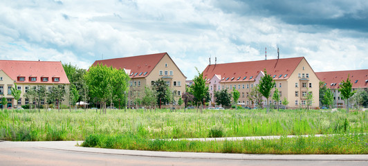 Fototapeta na wymiar Country landscape with residential buildings