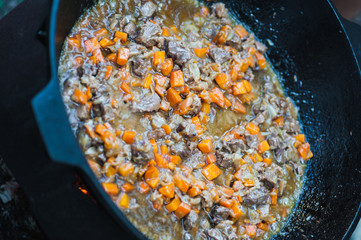 ingredients for pilau food prepare in cauldron