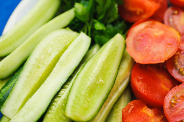 heap of many tomato and cucumber cuts