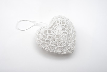 white heart made ​​of thread