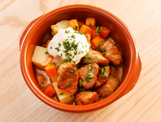 meat and vegetables in the pot