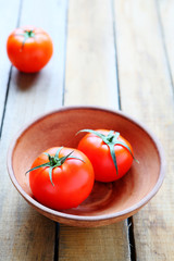 fresh tomatoes in bowl for salad