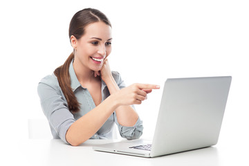 Woman pointing at laptop