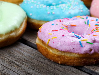 Donuts on a wooden background