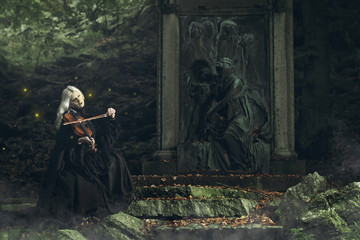 Gothic portrait of a dark lady playing a fiddle