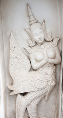 Fototapeta na wymiar Ramajana wyryte w kamieniu na Wat Arun, Temple of Dawn, Bangko