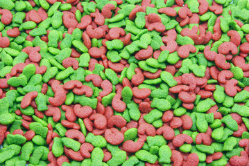 Top view of dog food. Red and green dog treats