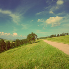 summer landscape with road - vintage retro style