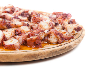 Pulpo a feira in a wooden plate