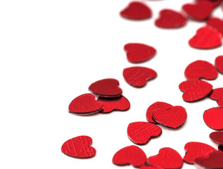 Valentines decoration of red confetti hearts against