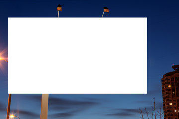 Empty roadside billboards at evening in city